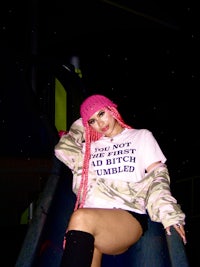 a girl sitting on a slide